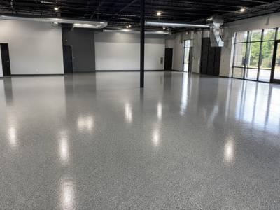 Grey flake floor in an open commercial unit